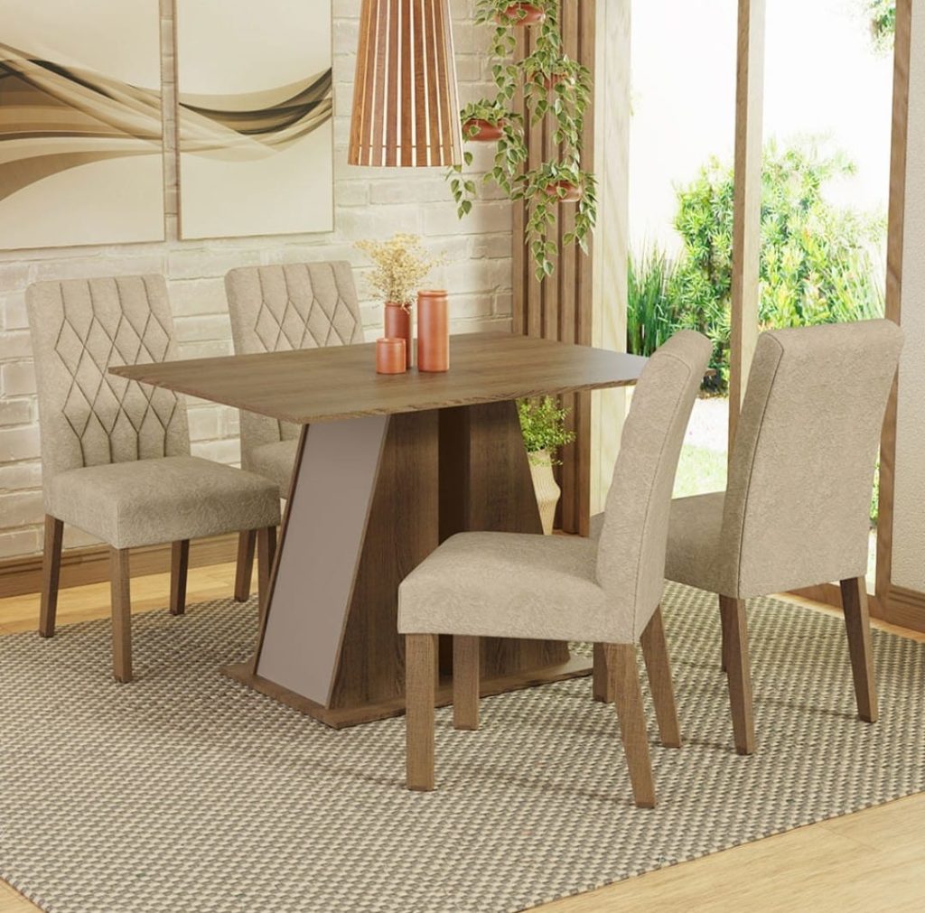 Mesa de jantar de madeira, cercada por seis cadeiras bege, decorada com vasos de plantas e ao fundo uma grande janela com vista para o jardim.