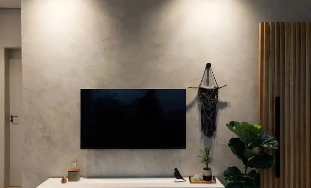 A imagem ilustra uma cor de parede para sala de tom neutro.