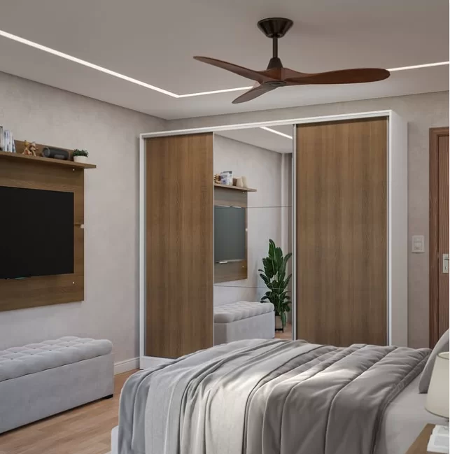 quarto com cama e puff em cores cinza e branca, armário com portas de madeira e espelho, rack de madeira e teto rebaixado com fitas de led nos vãos