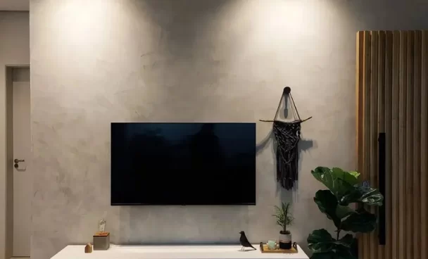 A imagem ilustra uma cor de parede para sala de tom neutro.